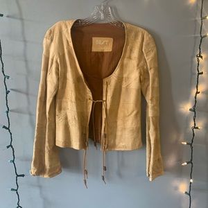 Hippie patch leather top worn at Woodstock